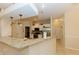 Eat-in kitchen features granite countertops, stainless steel appliances, white cabinetry and lots of natural light at 4657 Parkway Blvd, Land O Lakes, FL 34639