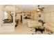 Bright living room featuring neutral tones, tile floors, and an open floor plan at 4657 Parkway Blvd, Land O Lakes, FL 34639