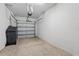 Spacious garage with a door and plenty of open space for storage or parking at 5024 Sylvester Loop, Tampa, FL 33610