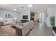 Spacious living room with hardwood floors, stylish furniture, and a cozy atmosphere perfect for entertaining at 5027 Overton Dr, New Port Richey, FL 34652