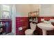 Cozy full bathroom featuring a red tiled wall and shower/tub combination at 5201 108Th N St, St Petersburg, FL 33708