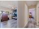 Spacious bedroom with ceiling fan and hardwood floors connects to another bedroom via the hallway at 5201 108Th N St, St Petersburg, FL 33708