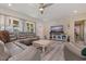 Inviting living area boasts hardwood floors, large windows, and comfortable seating at 5201 108Th N St, St Petersburg, FL 33708