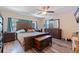 Spacious main bedroom with wood accents, hardwood floors, plenty of natural light and an ensuite bathroom at 5201 108Th N St, St Petersburg, FL 33708