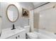 Bathroom featuring a shower-tub combo and single sink vanity at 5225 Brighton Shore Dr, Apollo Beach, FL 33572