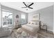 Cozy ' bedroom with hardwood floors, playful decor, and lots of natural light at 5225 Brighton Shore Dr, Apollo Beach, FL 33572