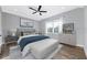 Modern bedroom features hardwood floors, natural light, and stylish contemporary furniture at 5225 Brighton Shore Dr, Apollo Beach, FL 33572