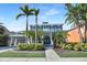 Charming two-story home featuring professional landscaping and a welcoming entrance at 5225 Brighton Shore Dr, Apollo Beach, FL 33572