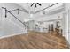 Expansive space integrates the kitchen with a breakfast bar, dining area, and living room, fostering a connected atmosphere at 5225 Brighton Shore Dr, Apollo Beach, FL 33572