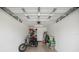Spacious garage with ample room for storage and an electric tricycle at 5496 Riverwalk Preserve Dr, New Port Richey, FL 34653
