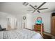 Cozy main bedroom with ample natural light and stylish decor at 5496 Riverwalk Preserve Dr, New Port Richey, FL 34653