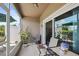 Comfortable screened patio with a ceiling fan and views of the landscaped surroundings at 5496 Riverwalk Preserve Dr, New Port Richey, FL 34653
