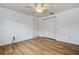 Well-lit bedroom featuring a ceiling fan, closet, and practical, beautiful hardwood floors at 5672 62Nd N Way, St Petersburg, FL 33709