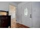Bright entryway with stained glass front door and wood floors at 5672 62Nd N Way, St Petersburg, FL 33709