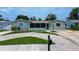 Charming single-story home with a well-maintained lawn and inviting curb appeal at 5672 62Nd N Way, St Petersburg, FL 33709