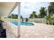 Inviting backyard pool area with patio and shed at 5672 62Nd N Way, St Petersburg, FL 33709