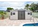 Storage shed with stylish double doors near pool at 5672 62Nd N Way, St Petersburg, FL 33709