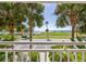 Balcony with partial ocean view, offering a relaxing space to enjoy the scenery and the proximity to playground at 611 Destiny Dr # 204, Ruskin, FL 33570