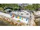 A waterfront recreational area offers picnic tables, seating, and beach access at 611 Destiny Dr # 204, Ruskin, FL 33570
