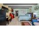 Charming studio with kitchenette, beamed ceiling, and living space at 611 Destiny Dr # 204, Ruskin, FL 33570