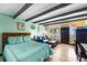Cozy studio with beamed ceiling and view to the outside balcony at 611 Destiny Dr # 204, Ruskin, FL 33570