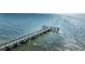 Long fishing pier extends into the water at 611 Destiny Dr # 204, Ruskin, FL 33570
