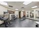 Well-equipped gym featuring free weights, machines, and mirrored walls, perfect for a complete workout at 611 Destiny Dr # 204, Ruskin, FL 33570
