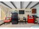 Studio kitchenette with appliances, cabinets, and a view of the outside at 611 Destiny Dr # 204, Ruskin, FL 33570
