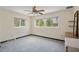 Spacious bedroom with large windows offering views of the surrounding landscape, creating a serene ambiance at 6132 7Th S Ave, Gulfport, FL 33707