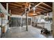 Spacious garage featuring a large door, an organization system, and a convenient work bench area at 6132 7Th S Ave, Gulfport, FL 33707