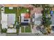 An aerial view of the property showing the lawn, solar panels and layout of the area at 6183 5Th S Ave, St Petersburg, FL 33707