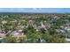 Wide aerial view showing the homes surrounded by mature trees in the neighborhood at 6183 5Th S Ave, St Petersburg, FL 33707