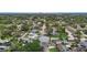 Aerial view showcasing the neighborhood homes with mature trees and landscaping at 6183 5Th S Ave, St Petersburg, FL 33707