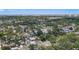 Aerial view of neighborhood, lots of mature trees, homes, and the city in the background at 6183 5Th S Ave, St Petersburg, FL 33707