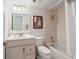 Classic bathroom featuring a vanity, mirror and a shower-tub combination, providing a functional space at 6269 Palma Del Mar S Blvd # 306, St Petersburg, FL 33715