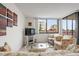 Inviting living room featuring large windows, comfortable seating, and stylish decor for a cozy atmosphere at 6269 Palma Del Mar S Blvd # 306, St Petersburg, FL 33715