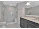 Bathroom with marble countertops, double vanity and glass enclosed walk-in shower at 700 S Harbour Island Blvd # 731, Tampa, FL 33602