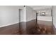 Open-concept living room with hardwood floors and a view of the bright kitchen at 700 S Harbour Island Blvd # 731, Tampa, FL 33602
