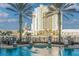 Beautiful pool area featuring palm trees and a picturesque view of the city skyline at 700 S Harbour Island Blvd # 731, Tampa, FL 33602