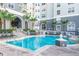 Beautiful community pool with comfortable lounge chairs and well-maintained landscaping at 700 S Harbour Island Blvd # 731, Tampa, FL 33602