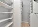 Walk-in closet featuring custom shelves, cabinets, and drawers at 700 S Harbour Island Blvd # 731, Tampa, FL 33602