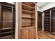 Spacious closet featuring custom wood shelving, providing ample storage space for an organized wardrobe at 704 Berrocales De Avila, Tampa, FL 33613