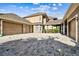 Exterior angle of this home with a 3 car garage and cobblestone driveway and accents at 704 Berrocales De Avila, Tampa, FL 33613