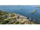 Stunning aerial view of a waterfront neighborhood with lush greenery and beautiful ocean views at 8296 33Rd N Ave, St Petersburg, FL 33710