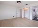 Bright bedroom features a light wood floor and a closet with shelving and hanging storage space at 8296 33Rd N Ave, St Petersburg, FL 33710