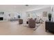 Bright living room showcasing natural light, a decorative fireplace, and neutral colors perfect for relaxation at 8296 33Rd N Ave, St Petersburg, FL 33710