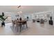Open living space featuring a dining area, a cozy seating area, and plenty of natural light at 8296 33Rd N Ave, St Petersburg, FL 33710