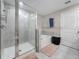 Bathroom featuring separate glass shower and soaking tub at 841 Royal Empress Dr, Ruskin, FL 33570