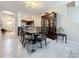 Open dining room area with elegant furnishings and seamless access to other living spaces at 841 Royal Empress Dr, Ruskin, FL 33570