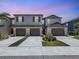 New construction townhomes featuring multi-car garages, modern exteriors, and manicured landscaping at 841 Royal Empress Dr, Ruskin, FL 33570